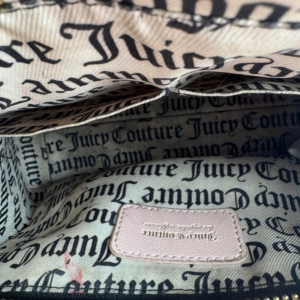 Y2K Juicy Couture satchel in pink, features an all-over embossed 
